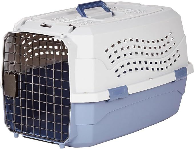 Two-door top-load dog carrier in blue and white - front wire door open showing interior